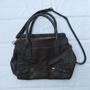 Gray and gold handbag